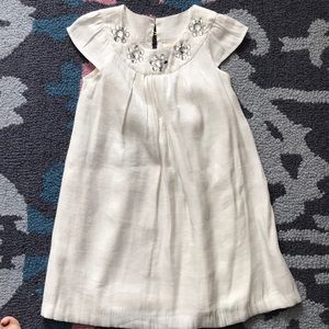 Fancy shimmery white cap sleeved dress